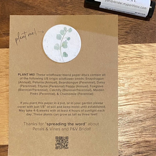 white cotton seed paper printed with euculaptus attached to a promotional card for P&V Bridal